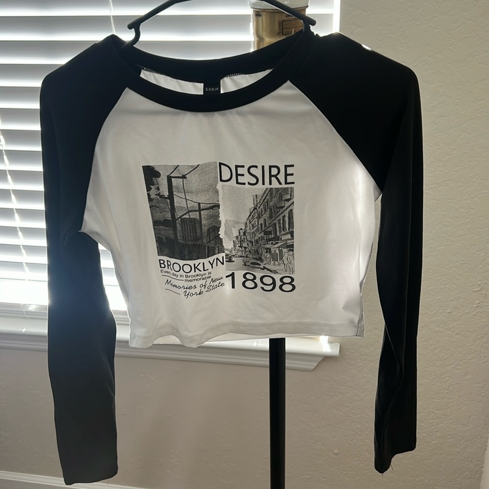Womens size small black & white Brooklyn baseball style shirt